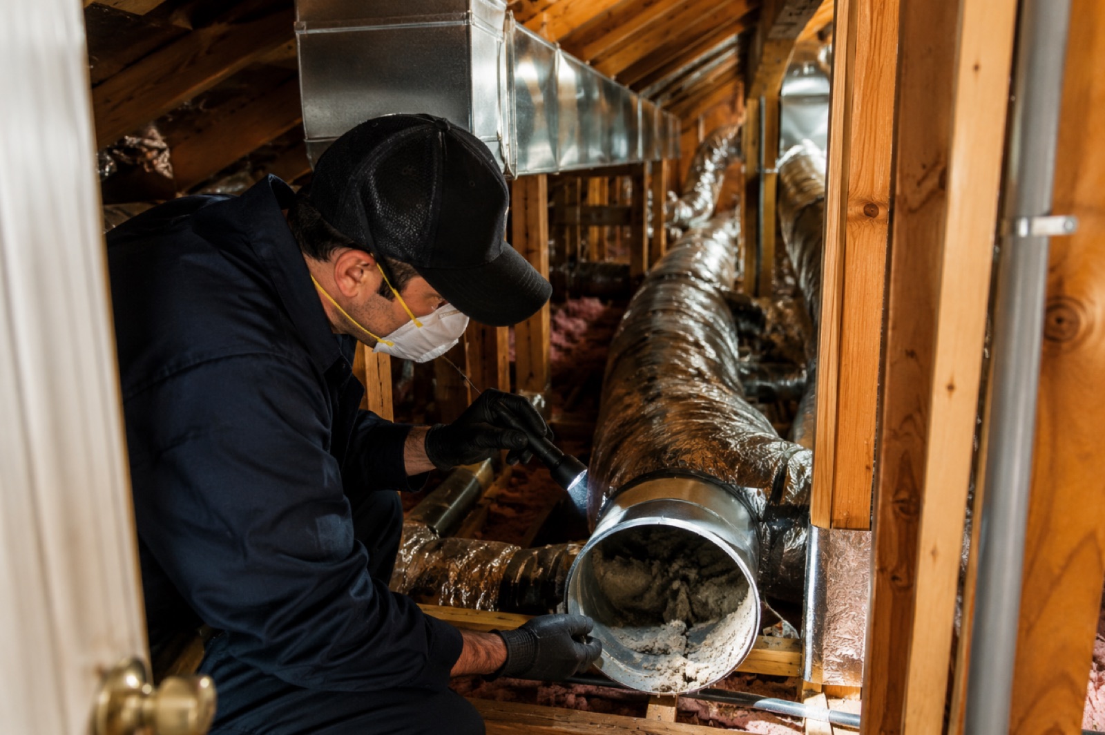 Home HVAC system showing ductwork complexity, access points, and cleaning factors affecting air duct cleaning cost